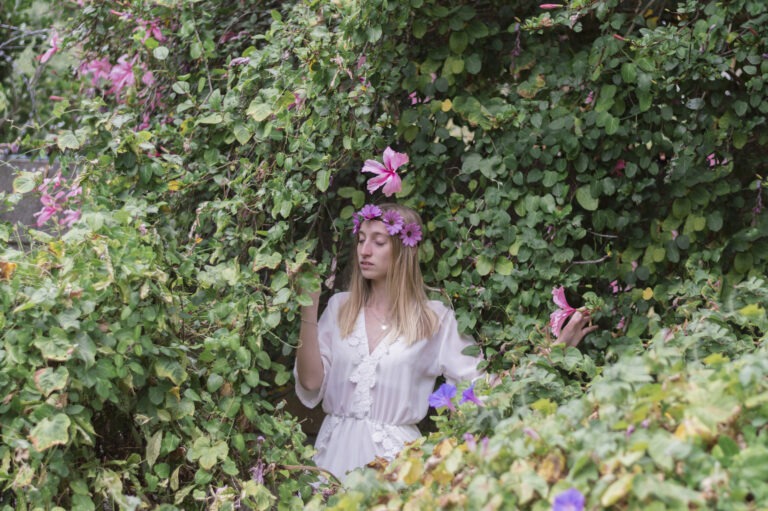 pretty-girl-looking-vegetation